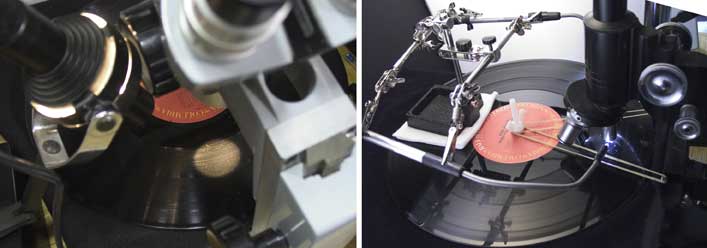 Two microscopes used to examine record surfaces